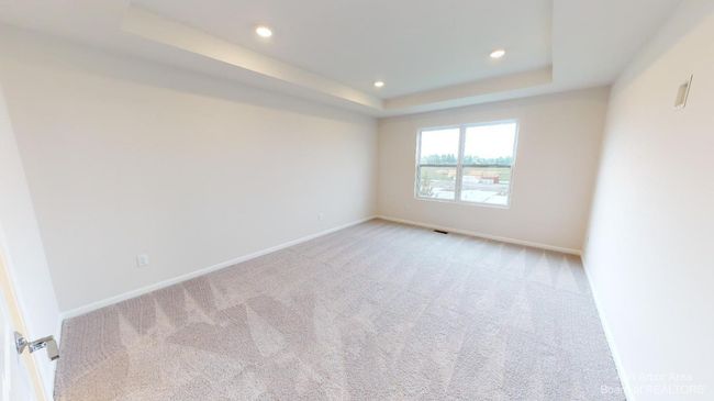 Upper level primary suite bedroom. | Image 14