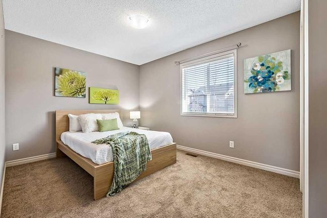 419 Cimarron Blvd, House other with 3 bedrooms, 3 bathrooms and 4 parking in Okotoks AB | Image 36