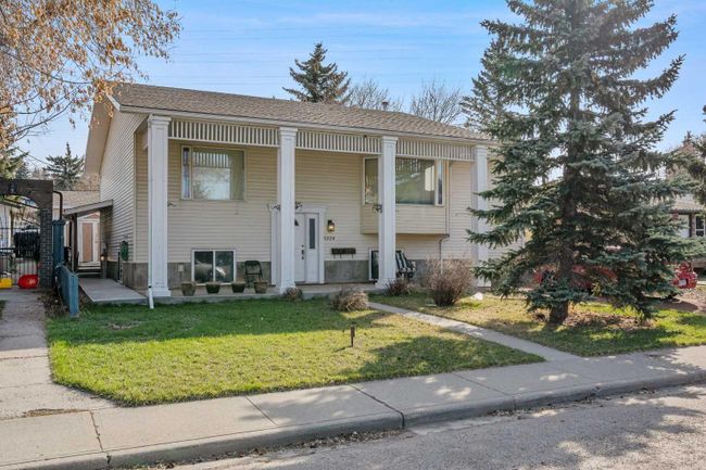 5220 19 Avenue Nw, Home with 4 bedrooms, 2 bathrooms and 5 parking in Calgary AB | Image 1