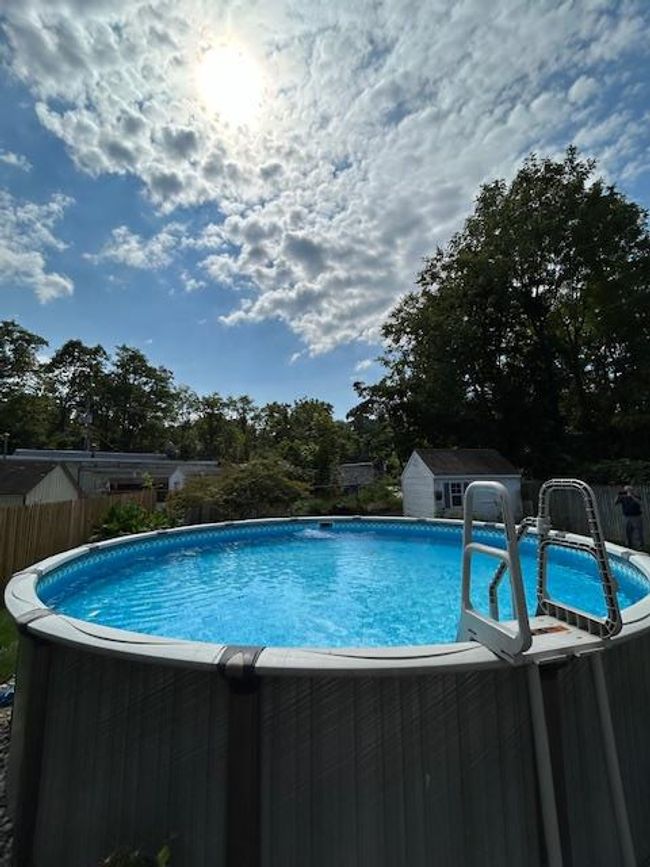 View of swimming pool and fence | Image 32