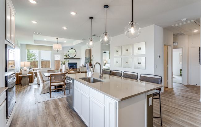 High-end gourmet kitchen with premium finishes and upgraded appliances *Model representation | Image 6