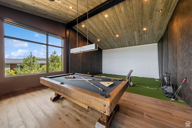 Playroom featuring wood ceiling, recessed lighting, hardwood / wood-style floors, and pool table | Image 121