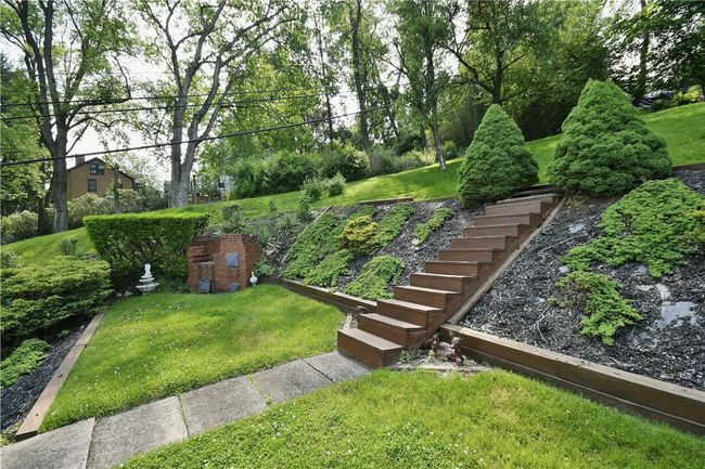 Tiered yard ready for gardening or outdoor fun. | Image 22