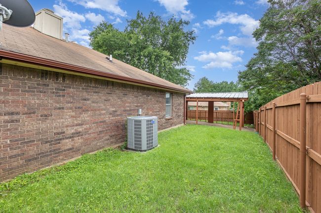 View of yard featuring central AC unit | Image 26