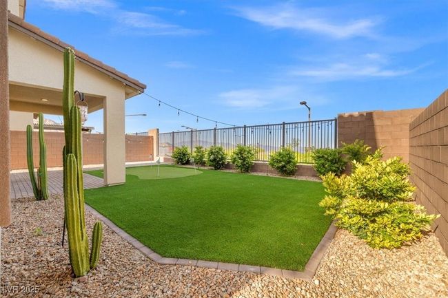 View of yard with a fenced backyard | Image 47