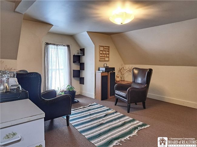 Upper Apartment - Living Room | Image 36