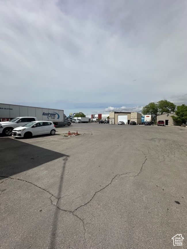 View of uncovered parking lot | Image 6