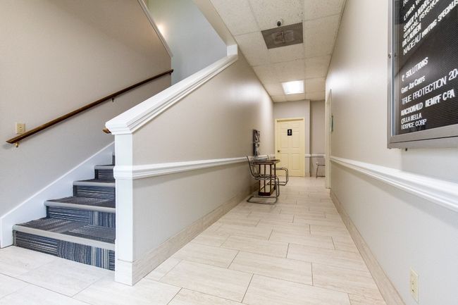 Hall featuring stairway and a paneled ceiling | Image 10