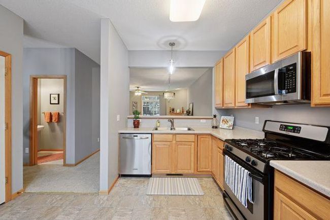 Bright, spacious Kitchen with extra counter space. | Image 9