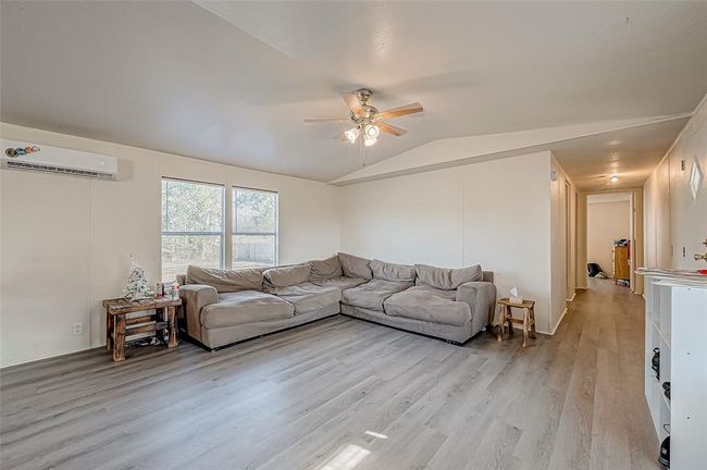 Living areas versatile layout can easily accommodate seating or be customized to suit your needs. | Image 8