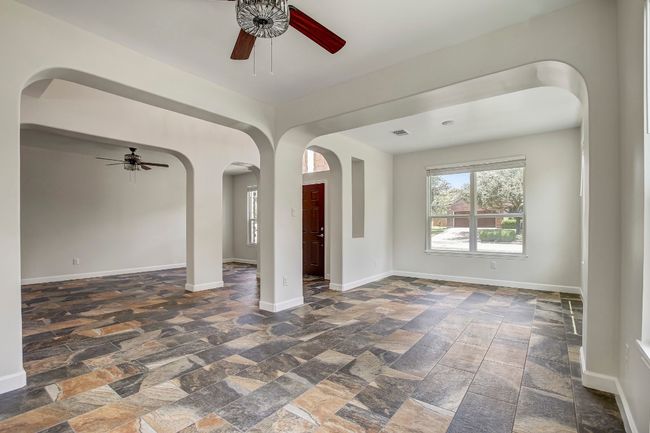 Living room #2 and dining room with tons of natural light and beautiful chandeliers | Image 8