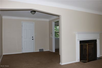 View of carpeted foyer entrance | Image 2