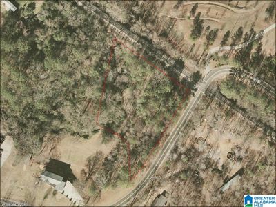 Property lot lines outlined in red of the 1.73 Acre Lot. Property is along Hwy 25 and Railroad St | Image 1