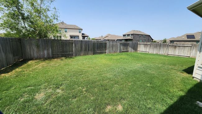 View of yard with a residential view | Image 31