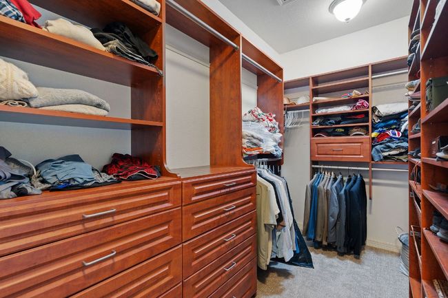 Walk in closet featuring carpet flooring | Image 27