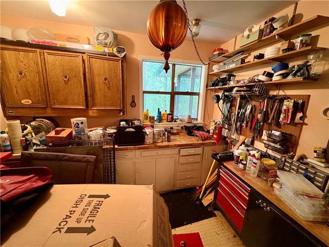 Oversized garage with built in workshop. It's messy with prepping for sale and move, but lots of workspace. | Image 26