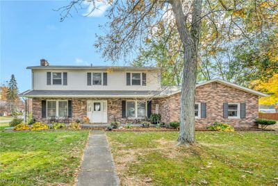 View of front of home featuring a front yard | Image 1