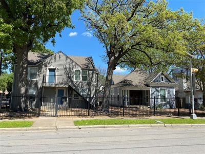 View of front of home with a balcony | Image 1