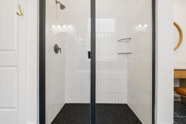 Bathroom featuring a shower stall | Image 20