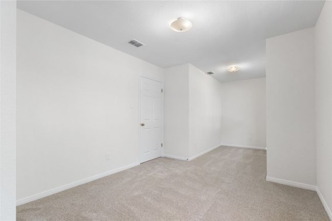 Unfurnished room featuring light carpet and baseboards | Image 21