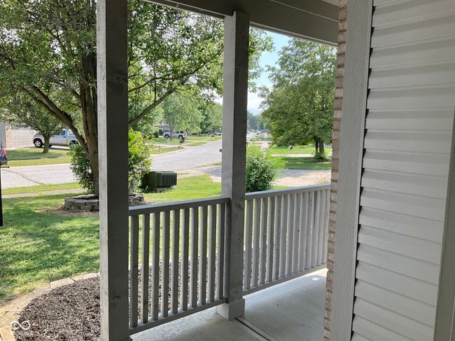 Great covered front porch with room for seating/swing | Image 5