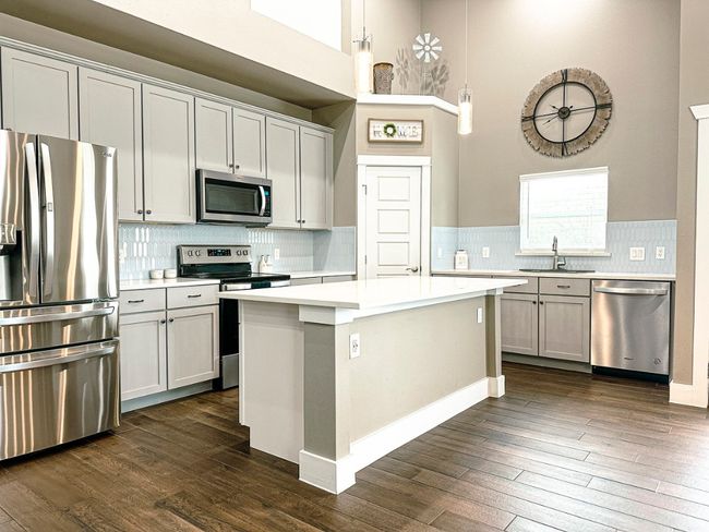 Kitchen with plenty of room. | Image 13