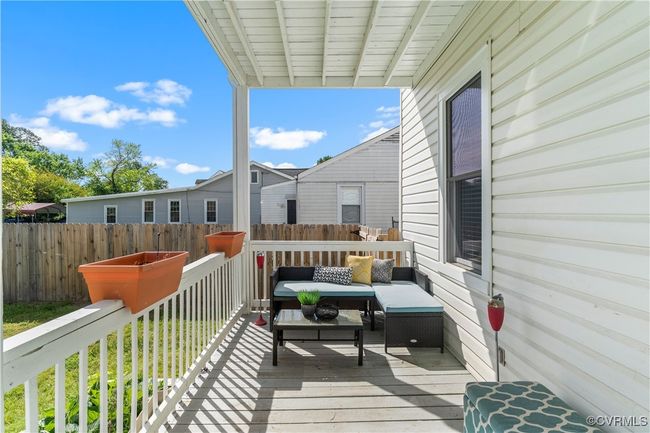 View of deck off of the kitchen featuring an outdoor hangout area and a deck | Image 19