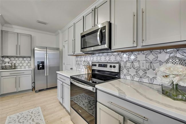 9188 Forge Breeze Loop, House other with 4 bedrooms, 3 bathrooms and null parking in WESLEY CHAPEL FL | Image 20