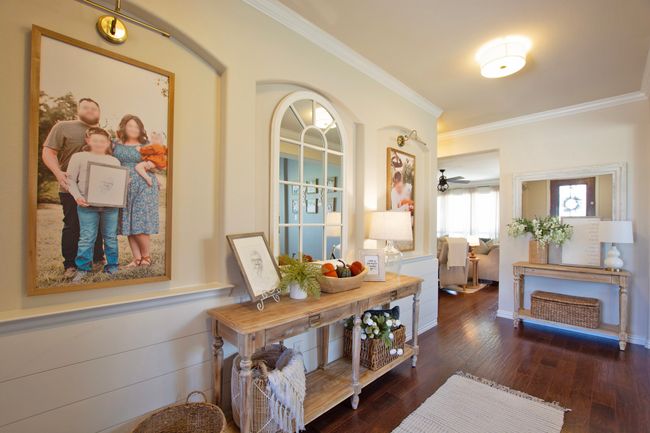 Hall with crown molding and wood finished floors | Image 5