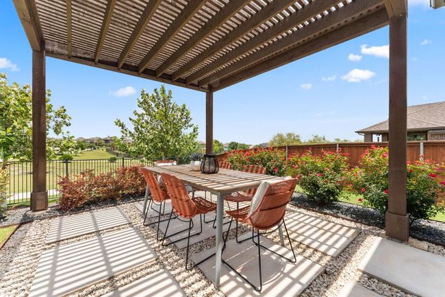 The backyard layout is perfect for hosting gatherings or quiet evenings under the stars. | Image 18