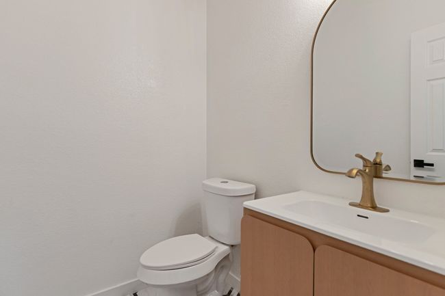 Half bath with vanity and toilet | Image 4