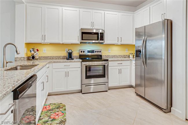14008 Winding Cedar Way, House attached with 3 bedrooms, 2 bathrooms and null parking in FORT MYERS FL | Image 9