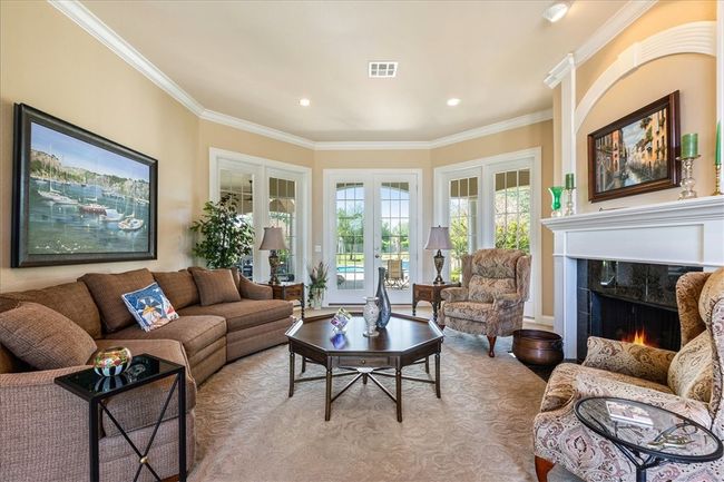 Formal Living Area with Fireplace | Image 7