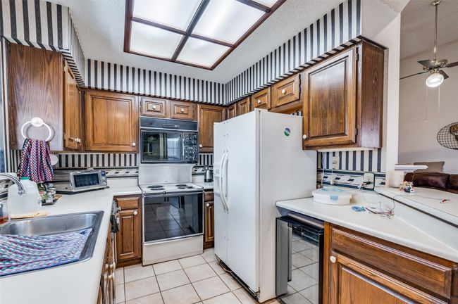 Kitchen with Refrigerator and wine fridge included | Image 10