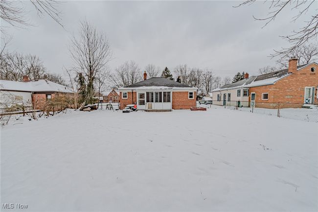 View of snow covered house | Image 13