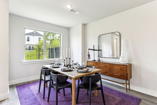 Dining space featuring baseboards and wood finished floors | Image 38