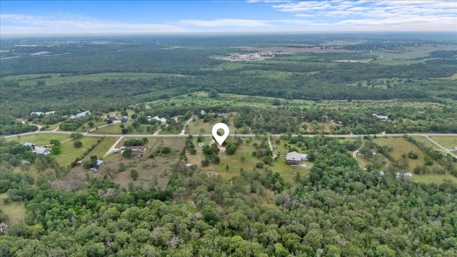 View of property location with a heavily wooded area | Image 23