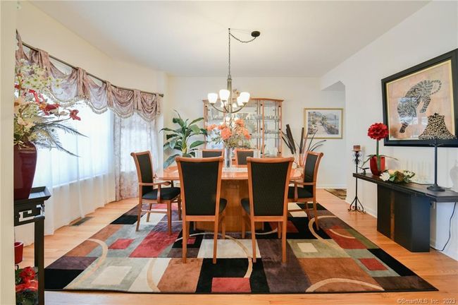 Bright and sunny dining room. | Image 4