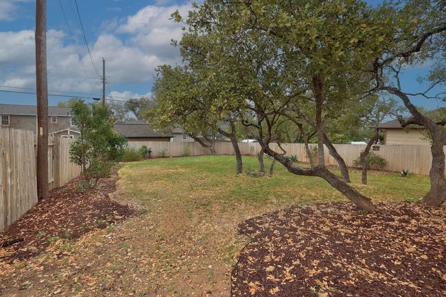 View of the large backyard | Image 24