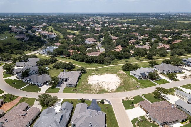 Aerial view of property's location featuring nearby suburban area | Image 6