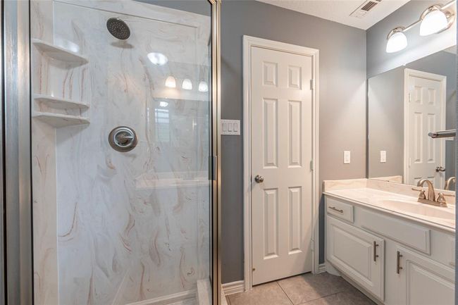 second primary bath down near the garage | Image 32
