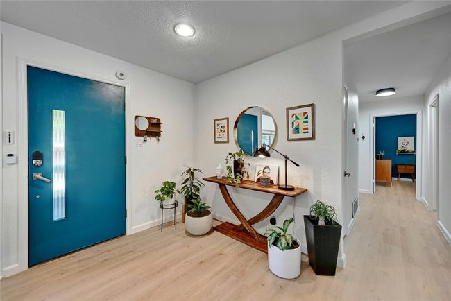 A look at the chic front door highlighted by a bright recessed light fixture. | Image 7