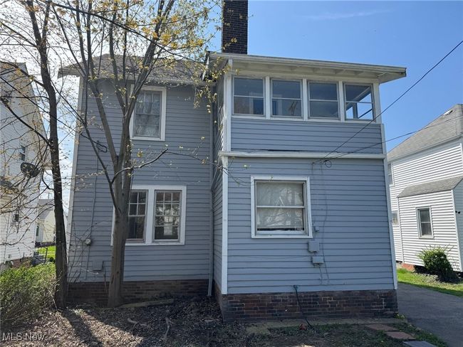 Rear view of property with a chimney | Image 18