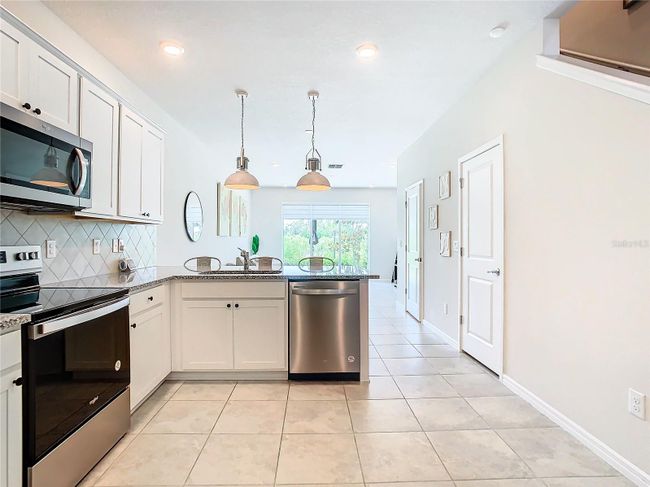 5381 Elmview Xing, Townhouse with 2 bedrooms, 3 bathrooms and null parking in WESLEY CHAPEL FL | Image 11