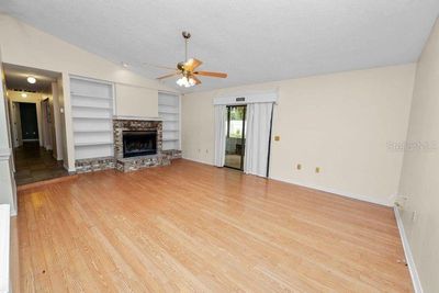 Family Room / Sliding Doors go to the Back Porch and the Pool. | Image 3