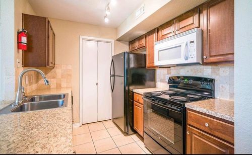 63-3900 Woodchase Dr, Houston, TX, 77042-5826 | Card Image
