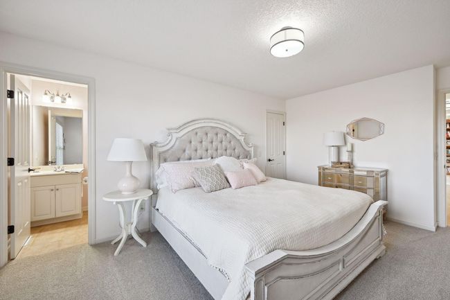 Bedroom 2 of 4 on the upper level has a walk in closet as well as private 3/4 bath. | Image 45