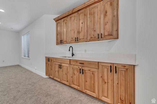 Bar featuring light carpet and recessed lighting | Image 30