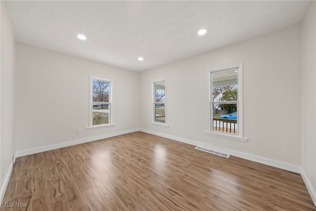 Unfurnished room featuring hardwood / wood-style flooring | Image 17
