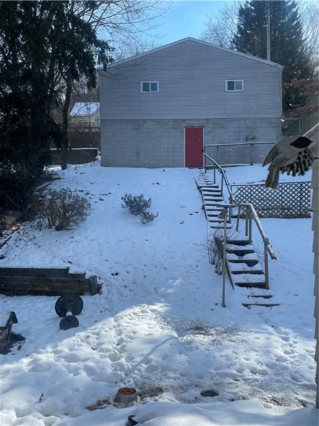 Two car detached garage with a full basement in the back yard | Image 16